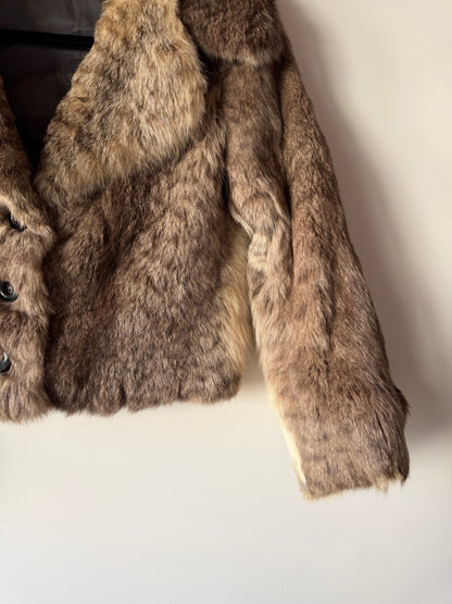 Veste en fourrure grise