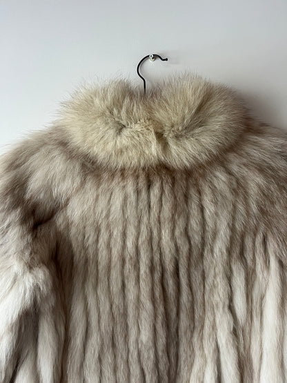 Manteau en fourrure galonné blanc