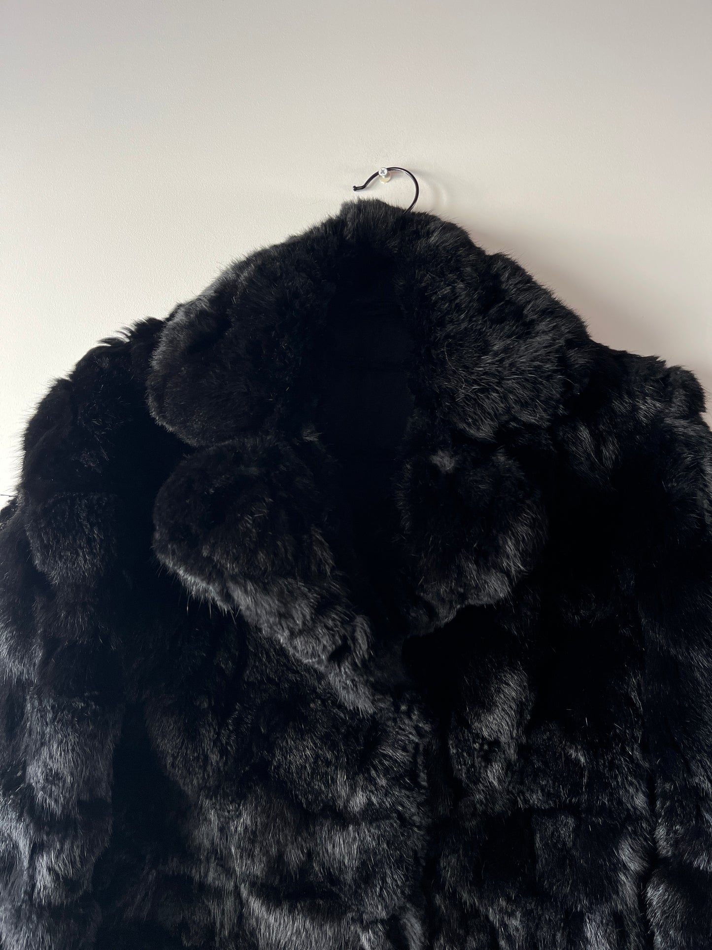 Manteau en fourrure noir