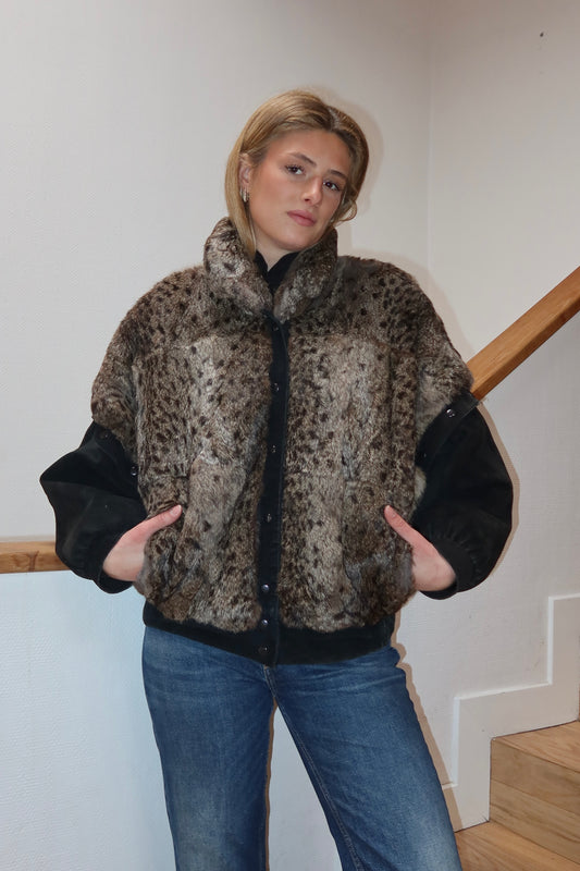 Veste en fourrure imprimée et cuir noir