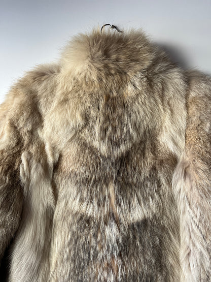 Manteau en fourrure beige et grise