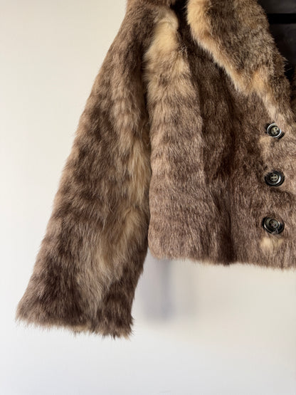 Veste en fourrure grise