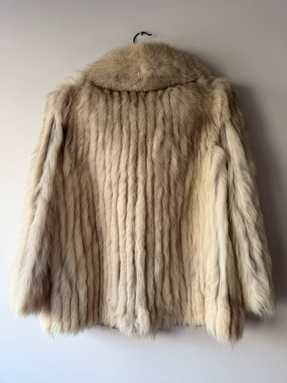 Manteau en fourrure galonné blanc