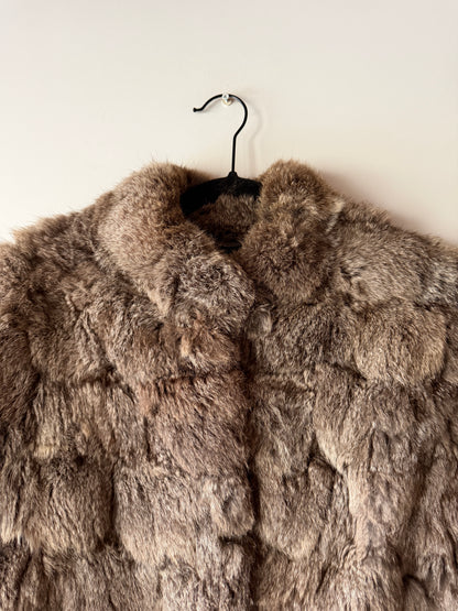 Manteau en fourrure gris