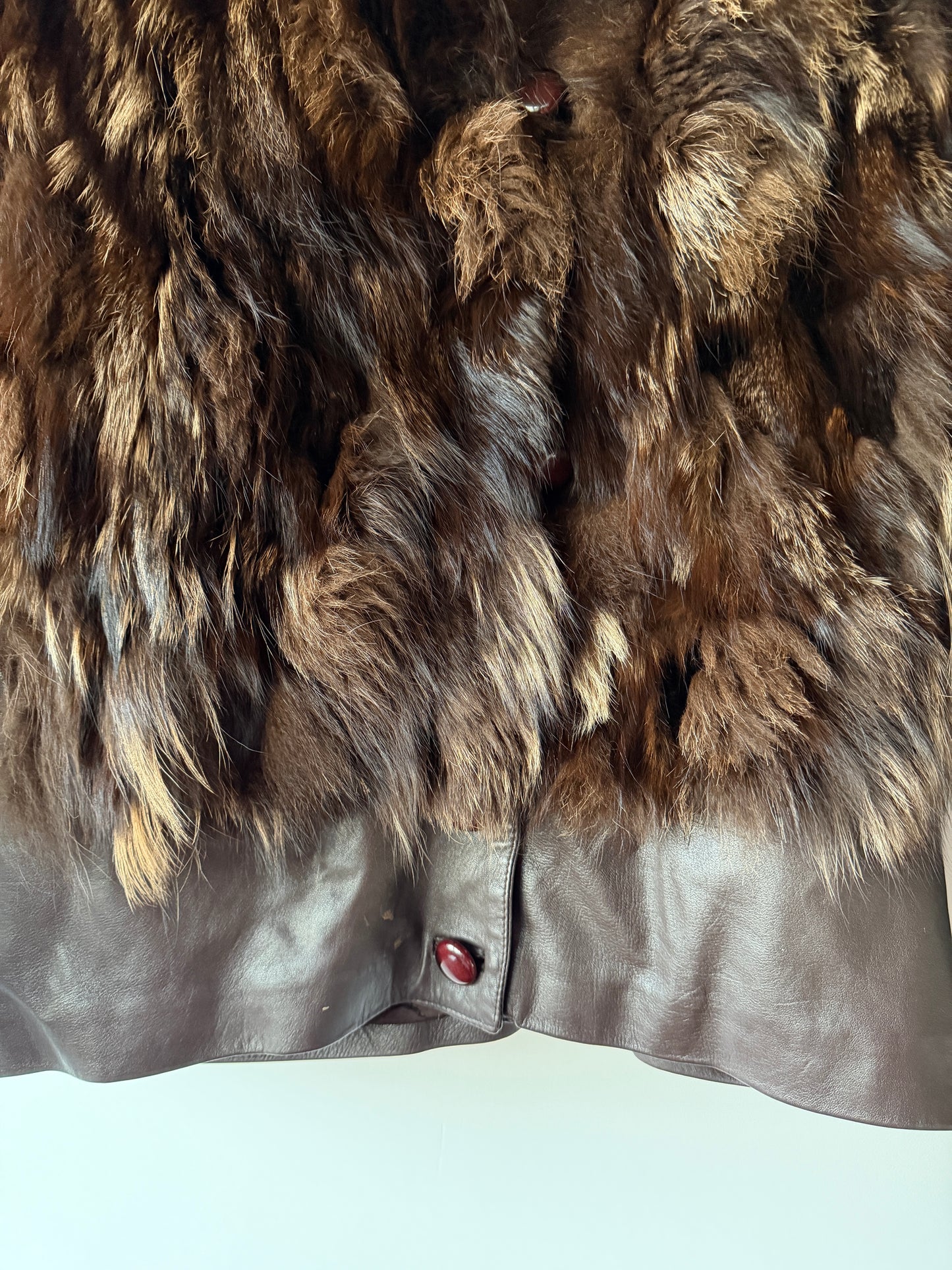 Veste en fourrure et cuir marron