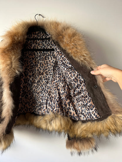 Veste en cuir avec bordures en fourrure