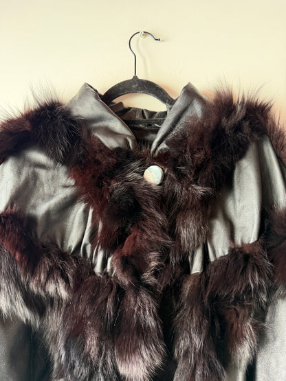 Veste en cuir et fourrure à manches chauve-souris