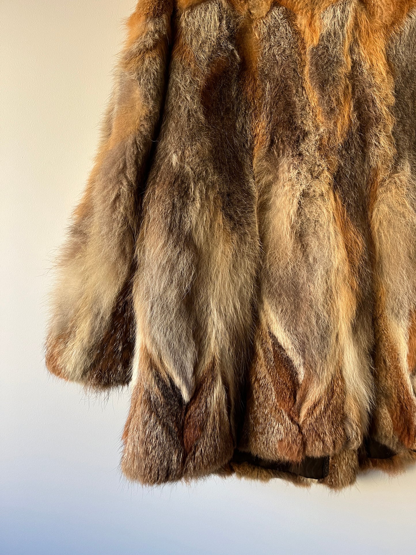 Manteau en fourrure roux doré