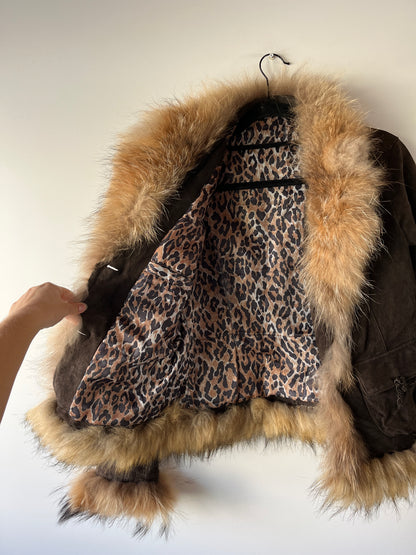 Veste en cuir avec bordures en fourrure