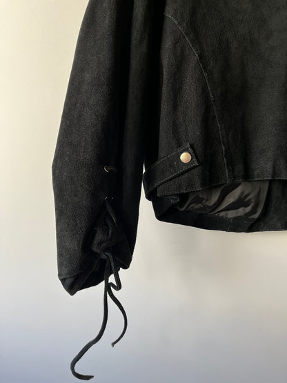 Veste en cuir noire à franges
