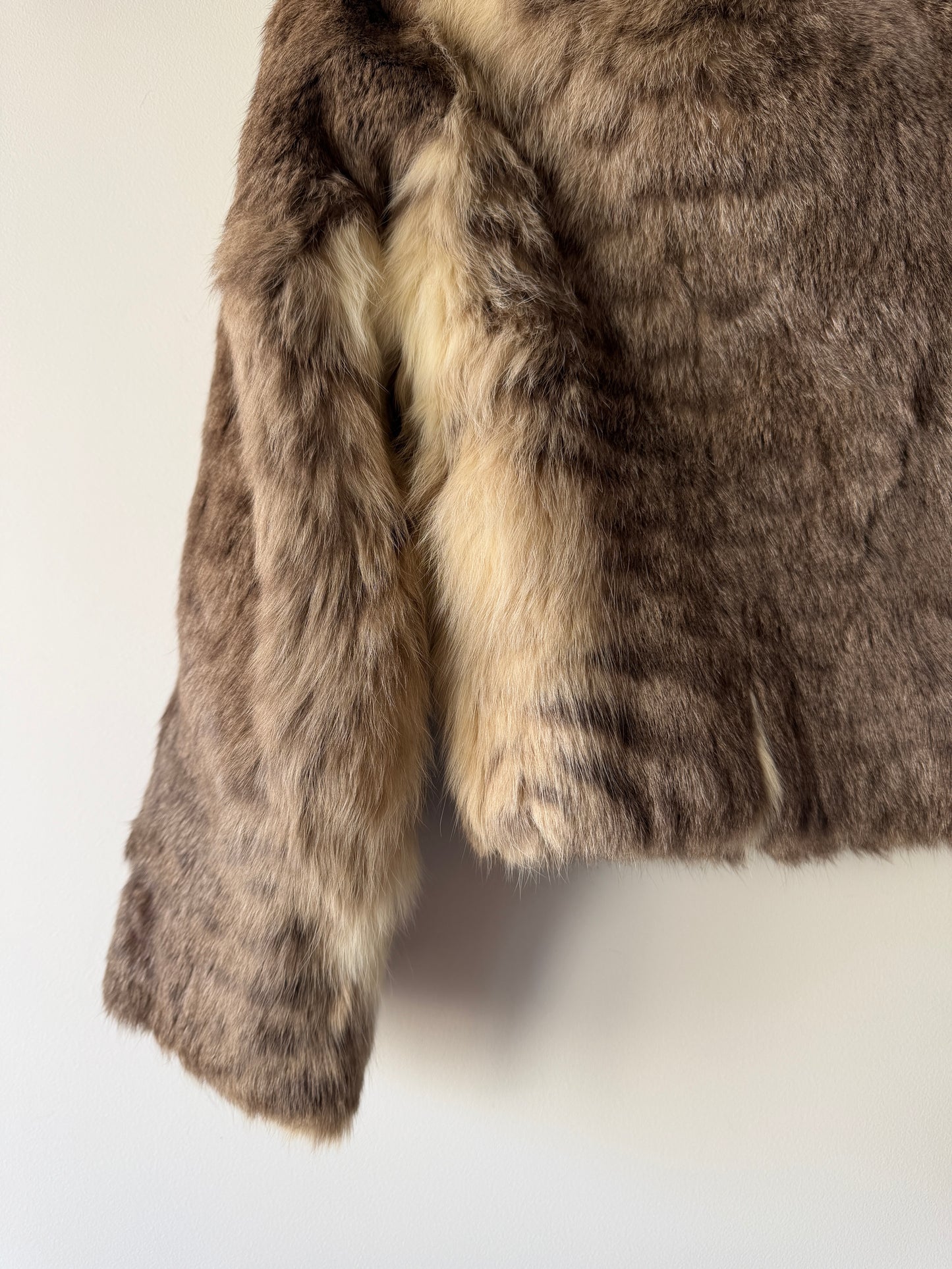 Veste en fourrure grise