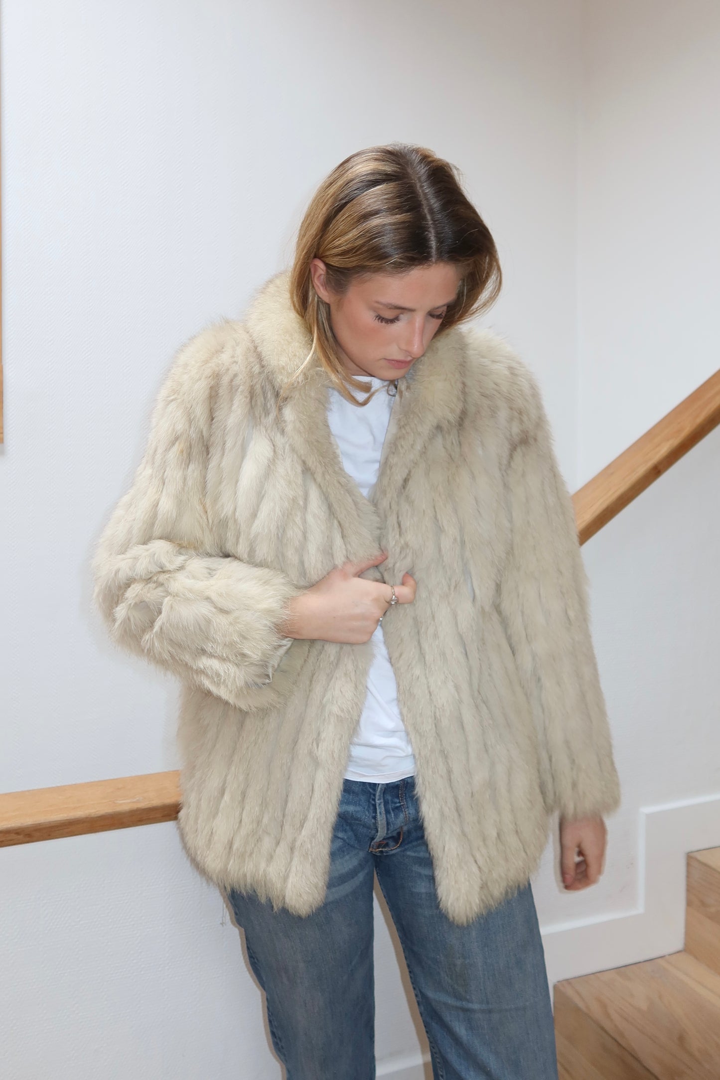 Manteau en fourrure galonné blanc