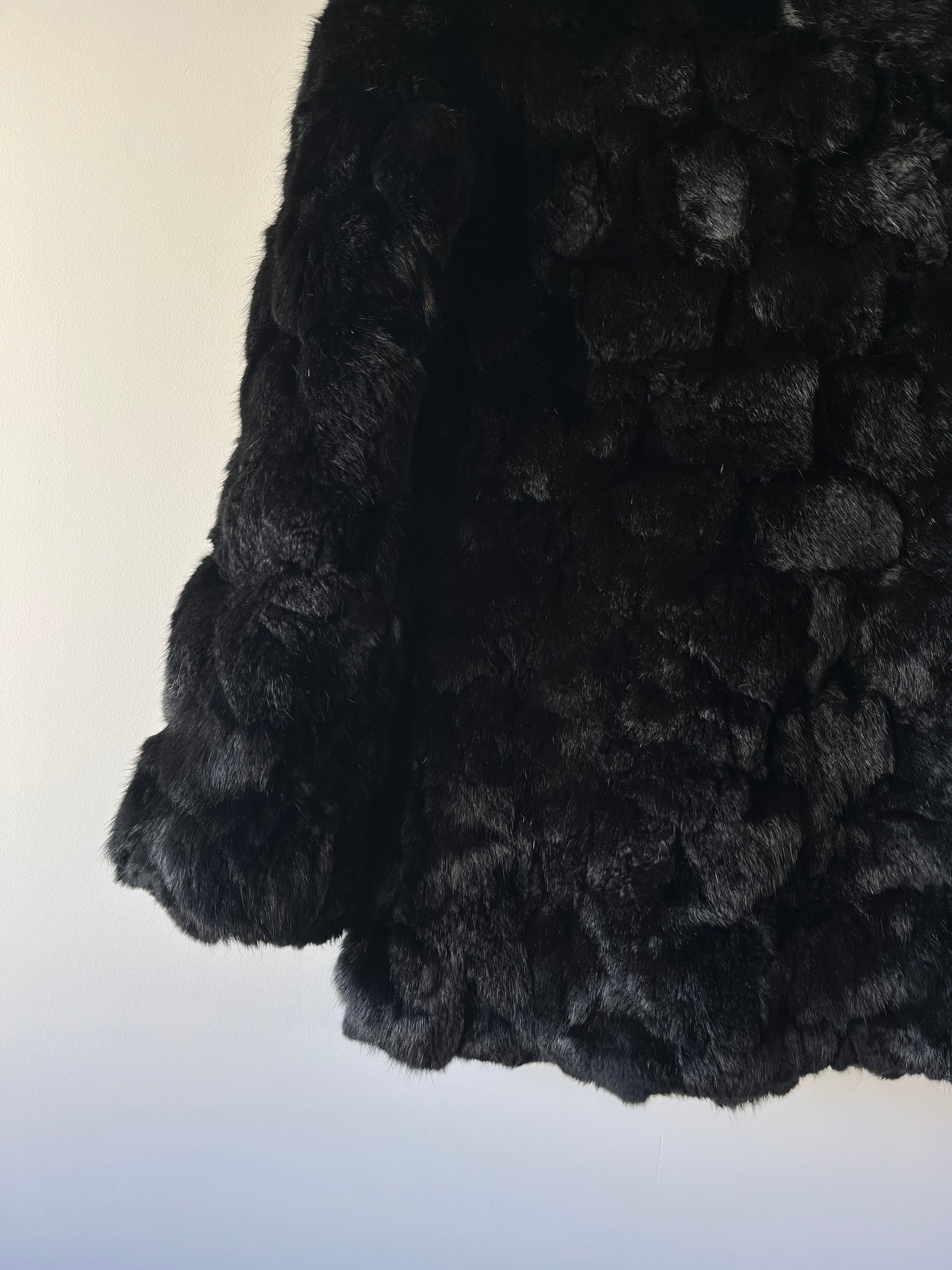 Manteau en fourrure noir