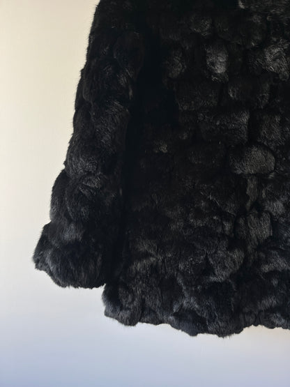 Manteau en fourrure noir