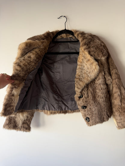 Veste en fourrure grise