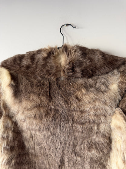 Veste en fourrure grise