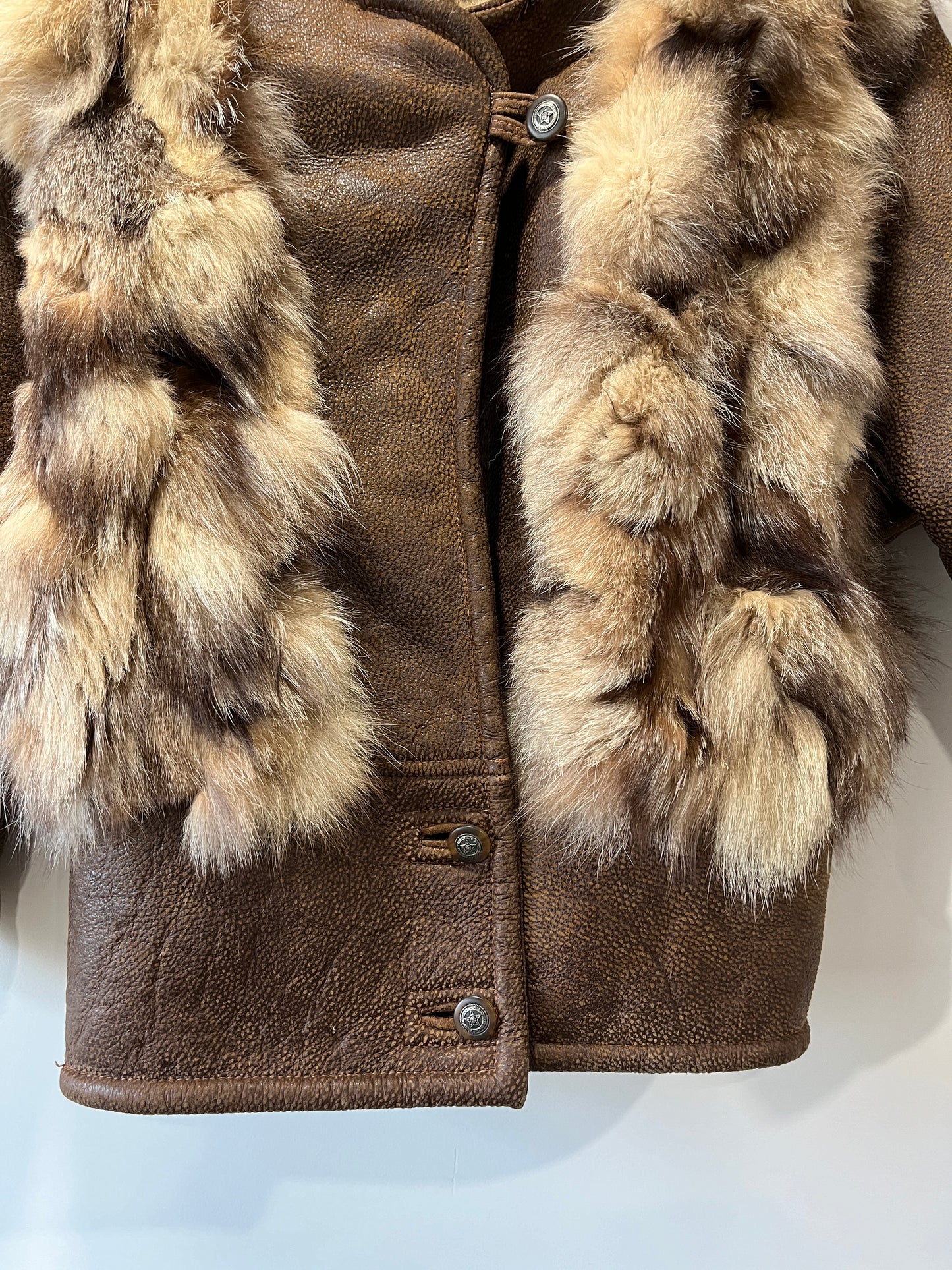 Veste en fourrure et cuir marron