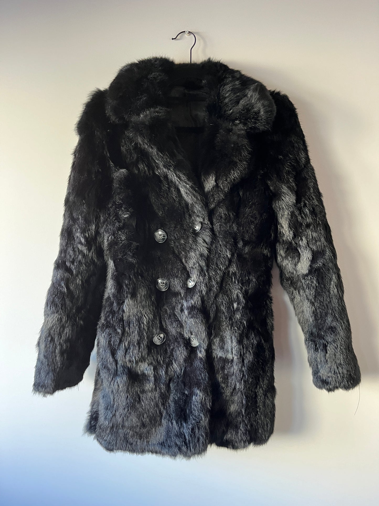 Manteau en fourrure forme caban