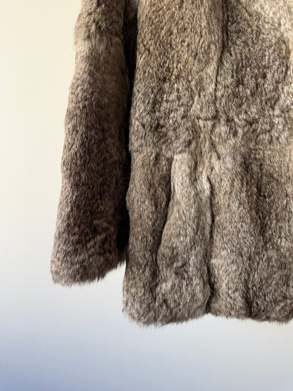 Manteau en fourrure gris