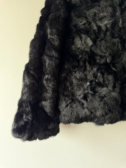 Manteau en fourrure noir
