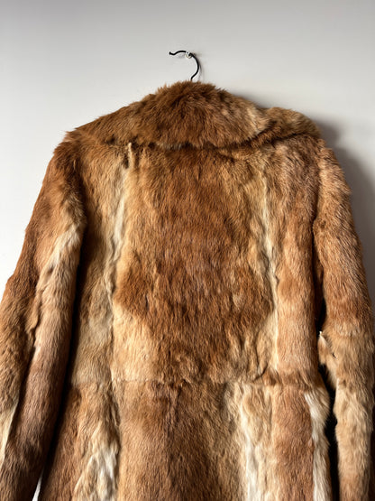 Manteau long en fourrure beige