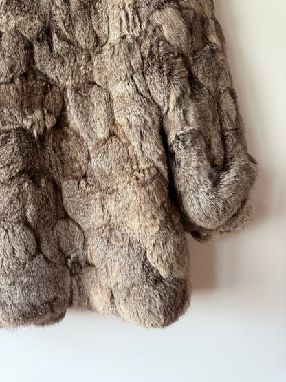 Manteau en fourrure gris