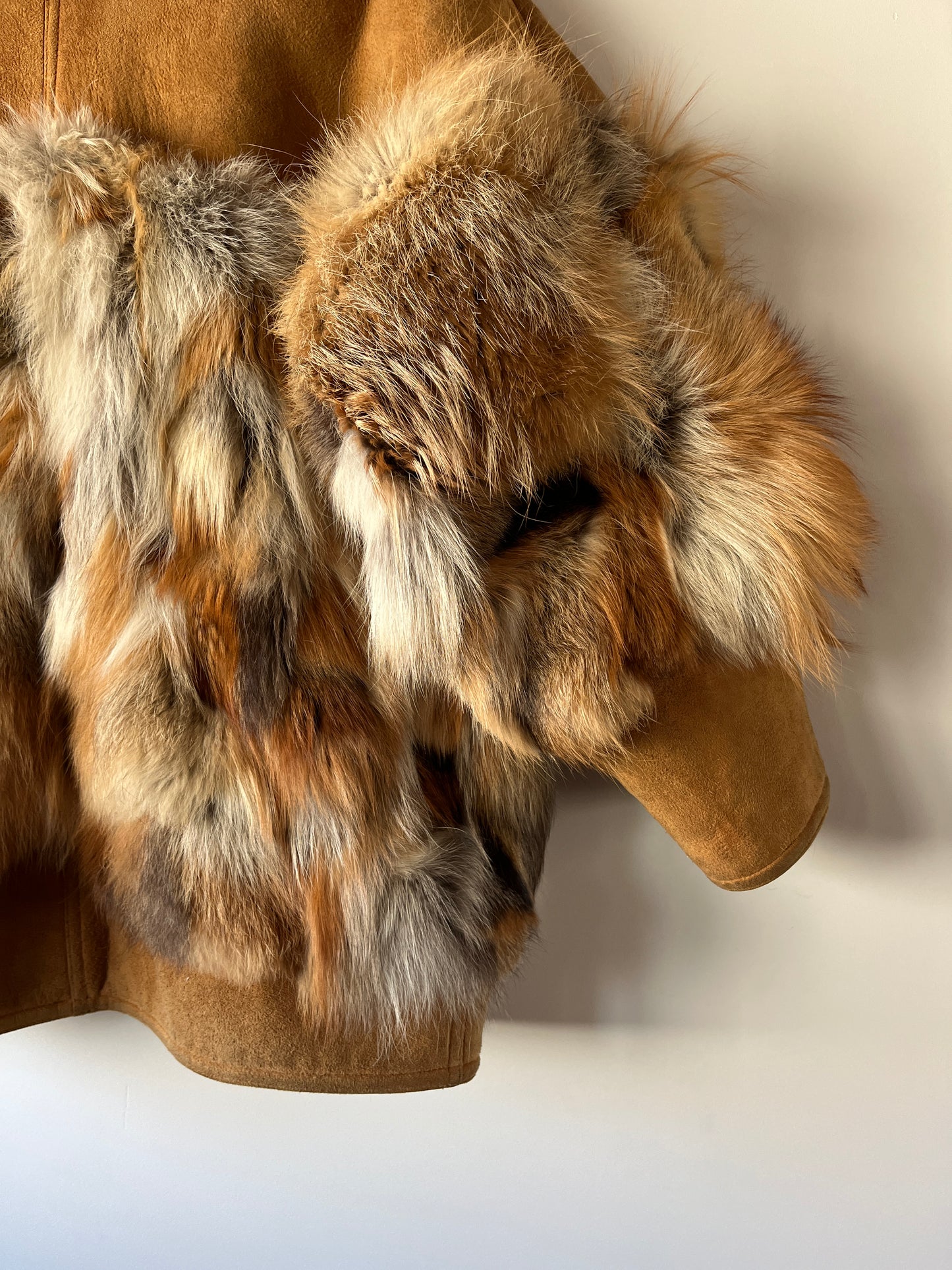 Veste en peau lainée et fourrure