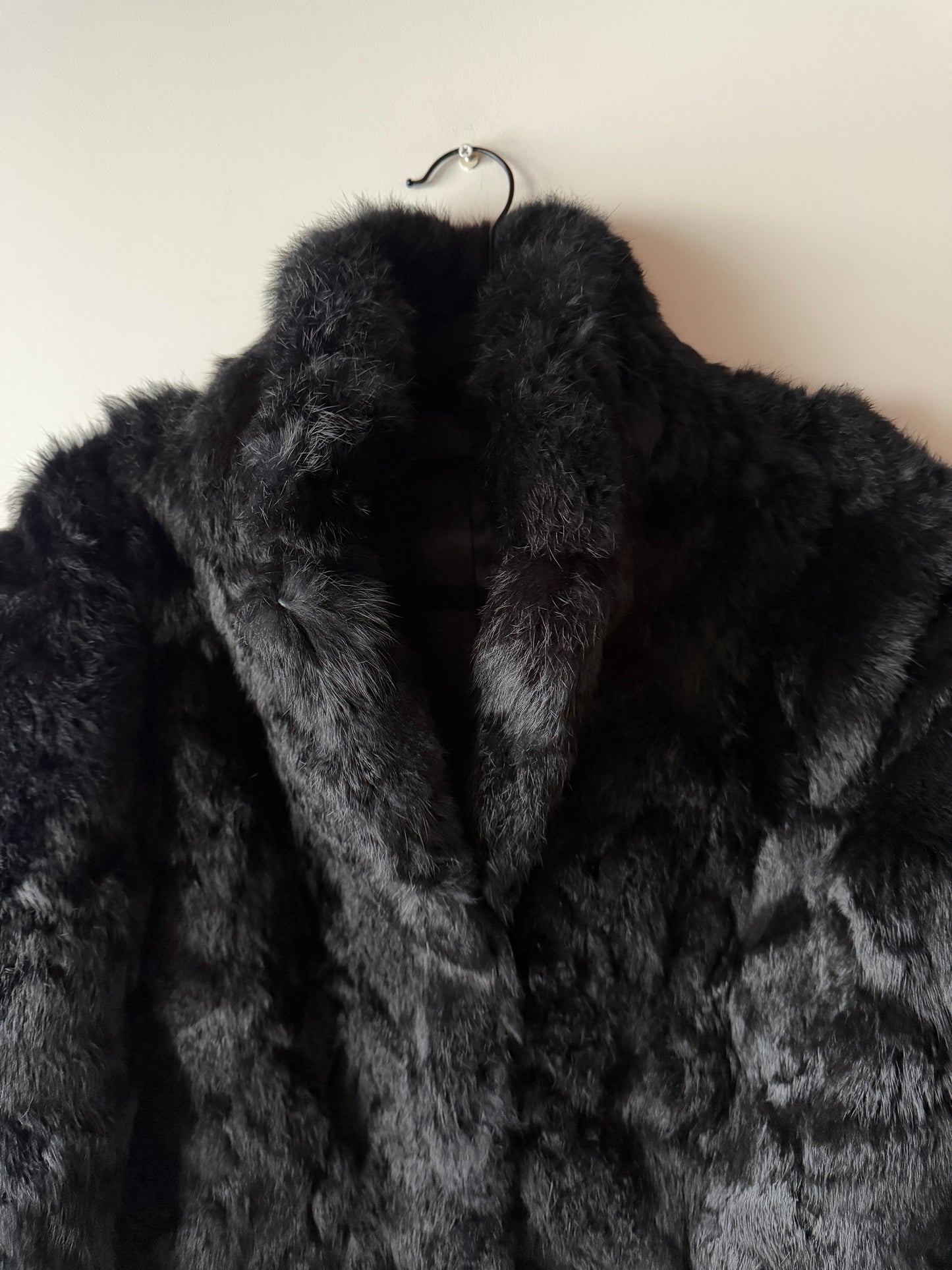 Manteau en fourrure noir