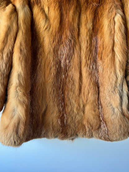 Manteau en fourrure roux doré