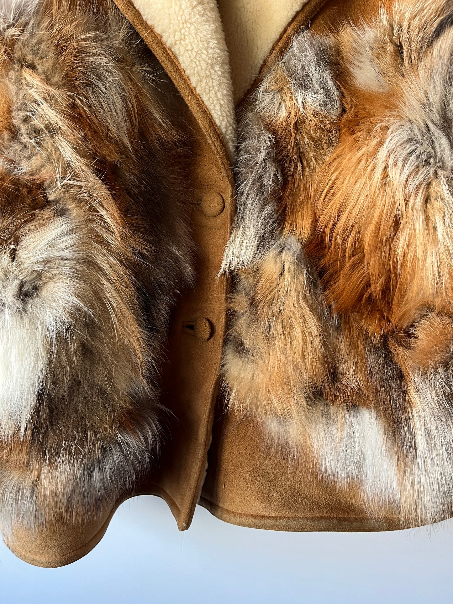 Veste en peau lainée et fourrure