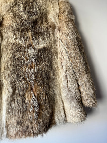 Manteau en fourrure beige et grise