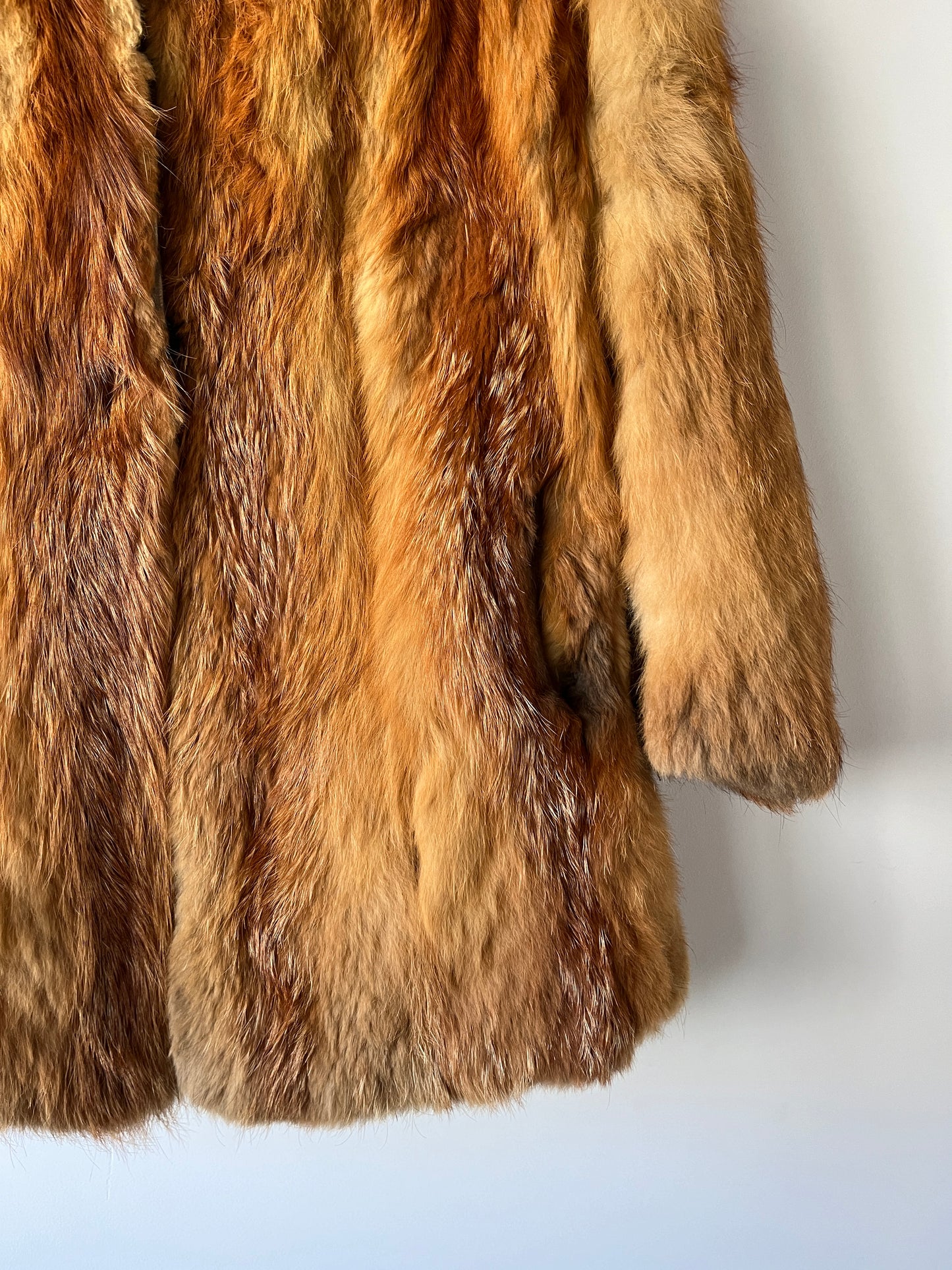 Manteau en fourrure roux doré