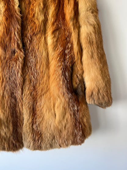 Manteau en fourrure roux doré