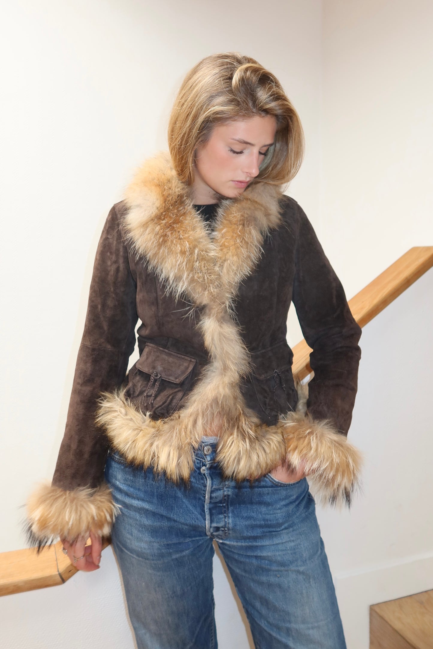 Veste en cuir avec bordures en fourrure