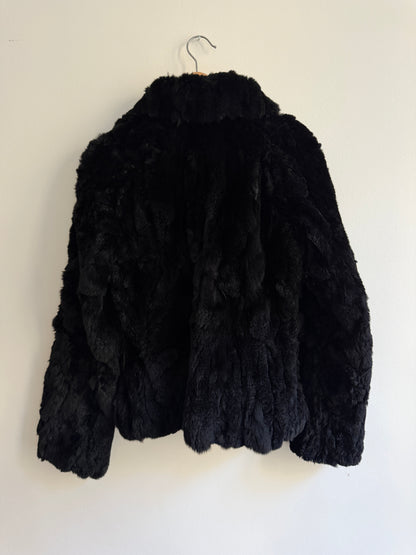 Veste courte en fourrure noire