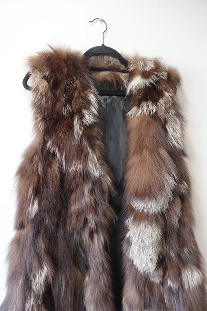 Manteau long sans manches en fourrure