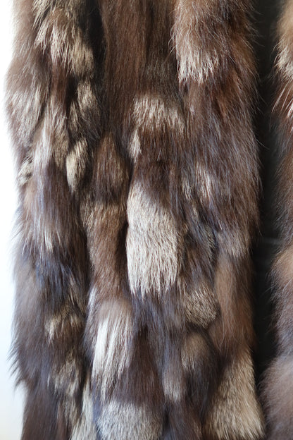 Manteau long sans manches en fourrure